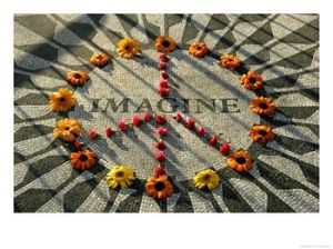 personaluse2_9050019~A-Makeshift-Peace-Sign-of-Flowers-Lies-on-Top-John-Lennon-s-Strawberry-Fields-Memorial-Posters